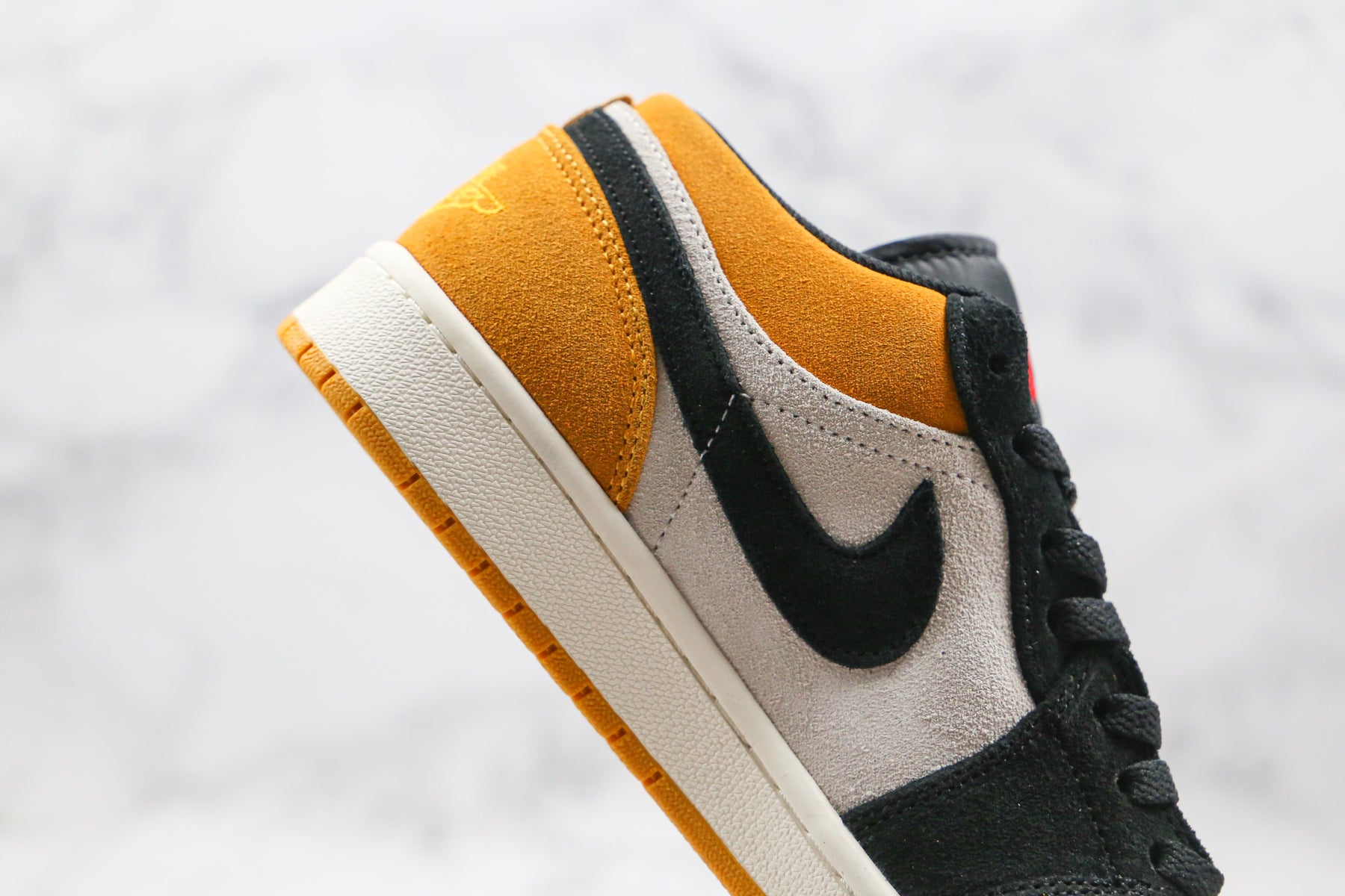 Jordan 1 Low University Gold Black